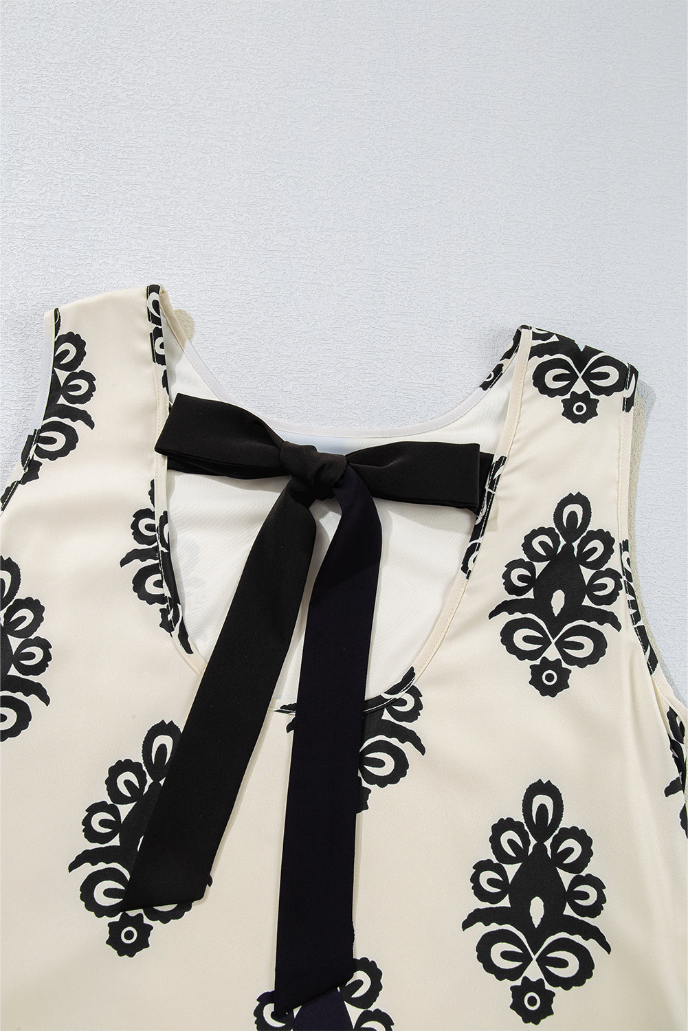 Geometric Bow‑Back Sleeveless Mini