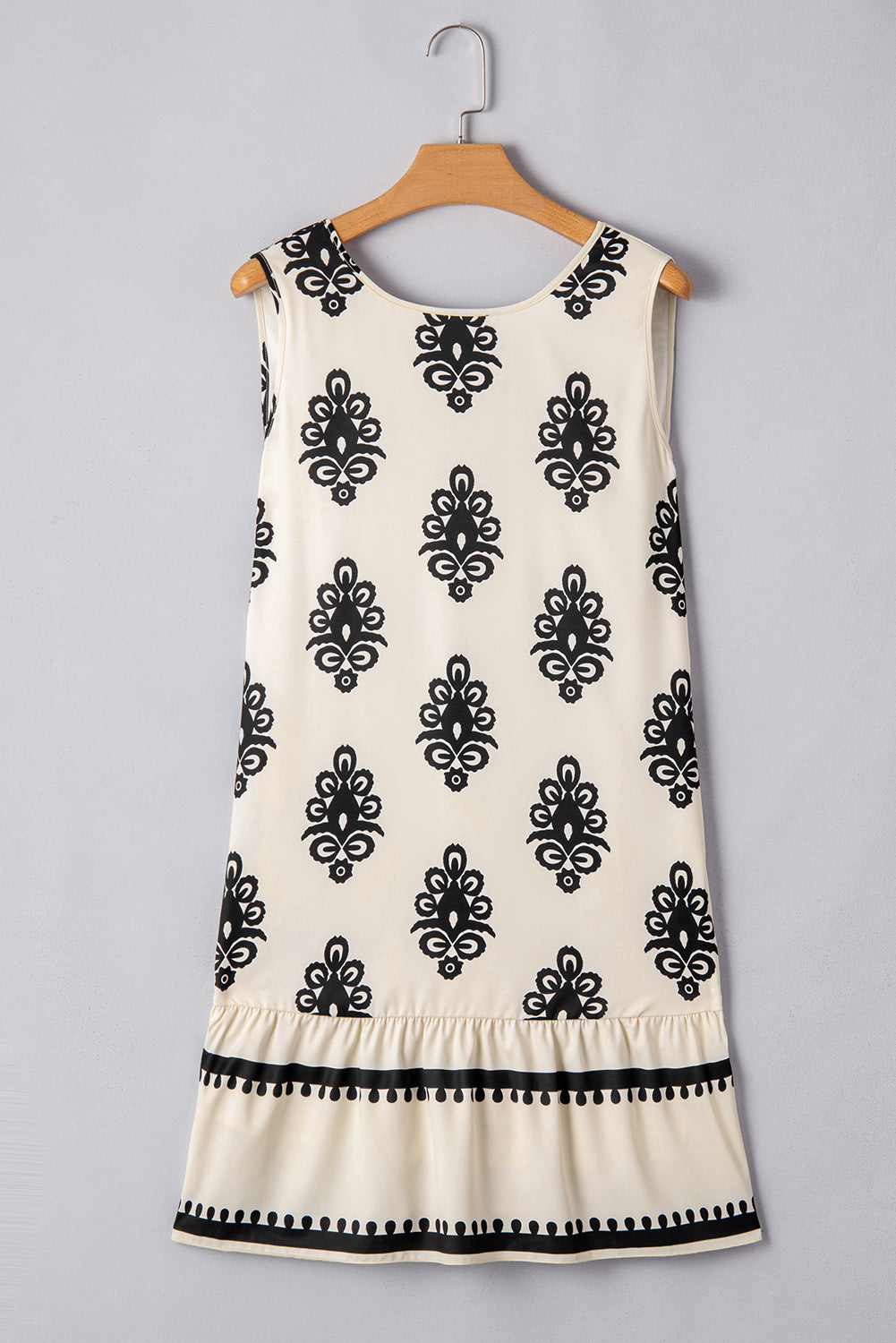Geometric Bow‑Back Sleeveless Mini