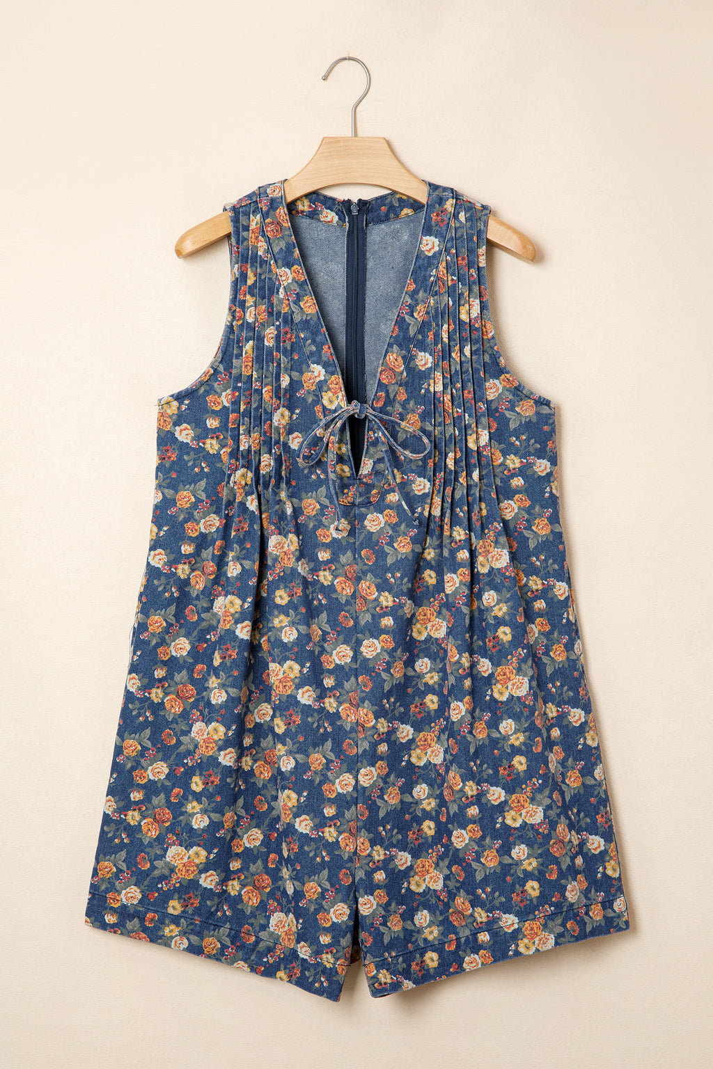The Blue Bloom Bow‑Tie Denim Romper
