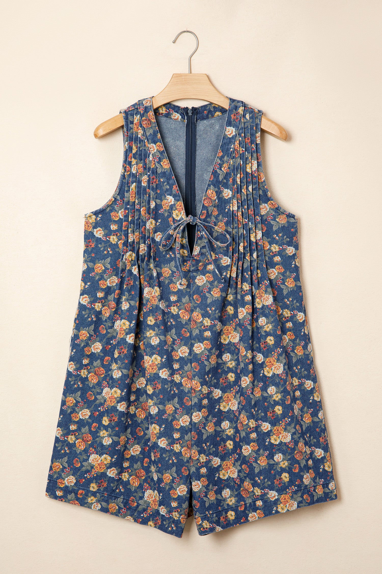 The Blue Bloom Bow‑Tie Denim Romper