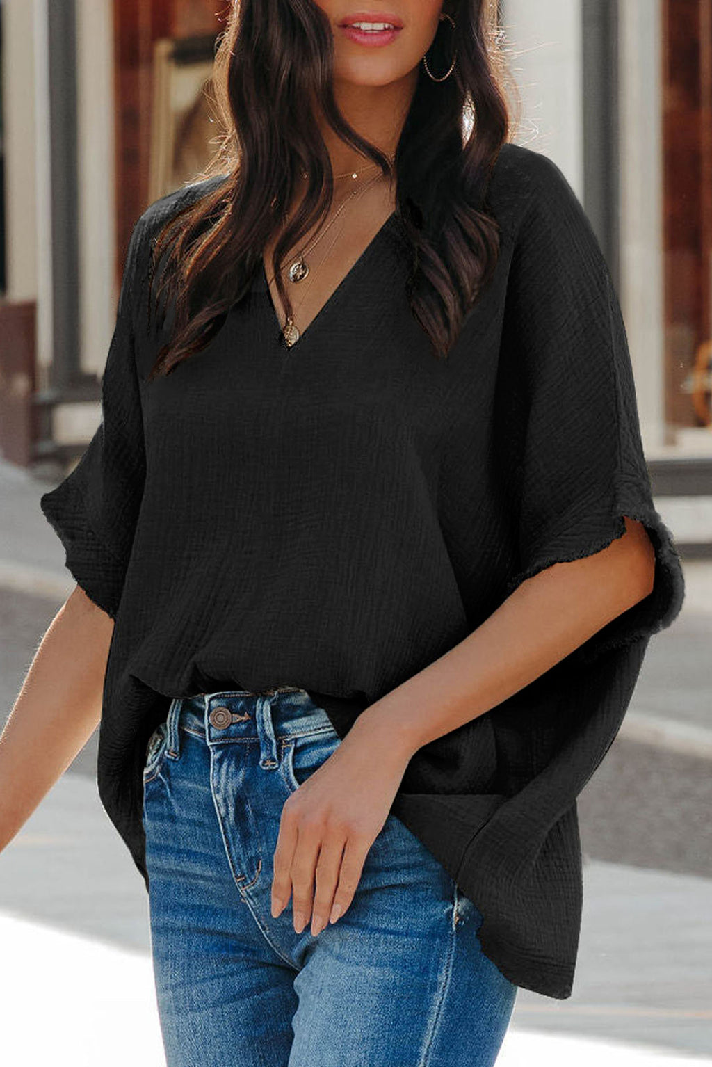 The Noir Fringe Batwing Blouse