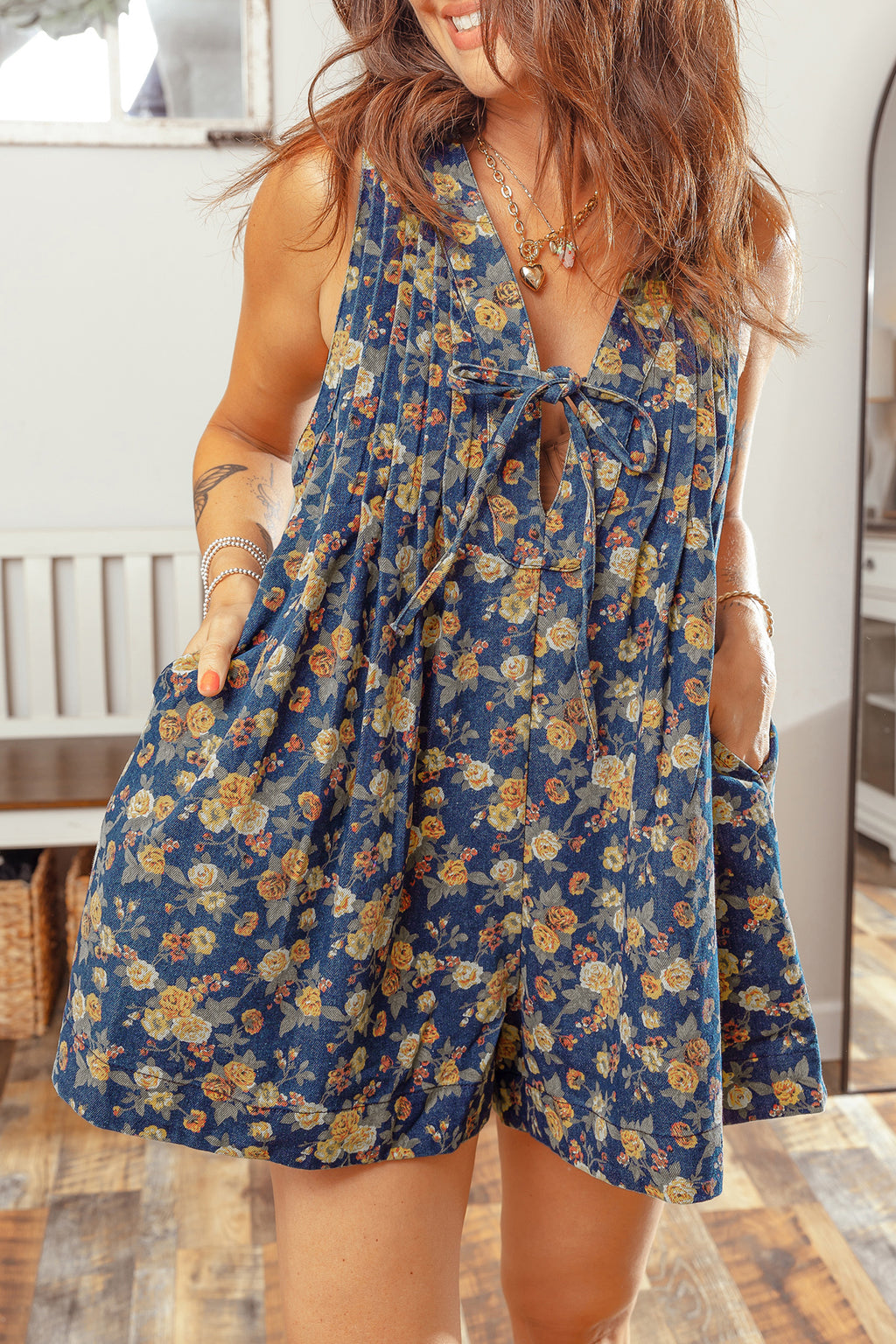 The Blue Bloom Bow‑Tie Denim Romper
