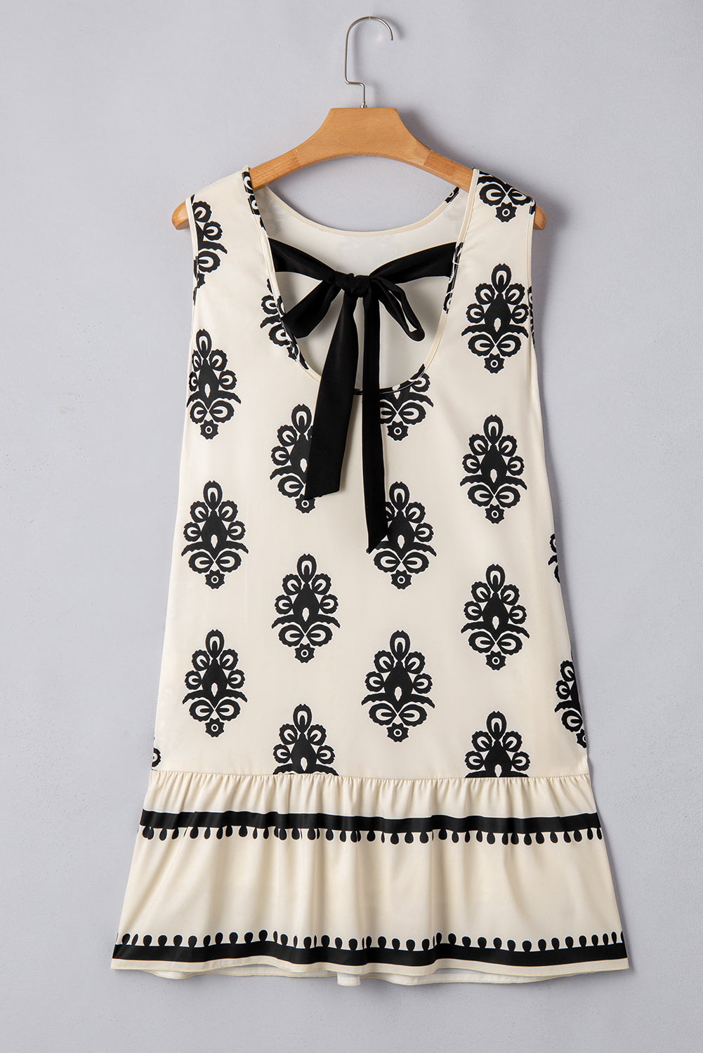 Geometric Bow‑Back Sleeveless Mini