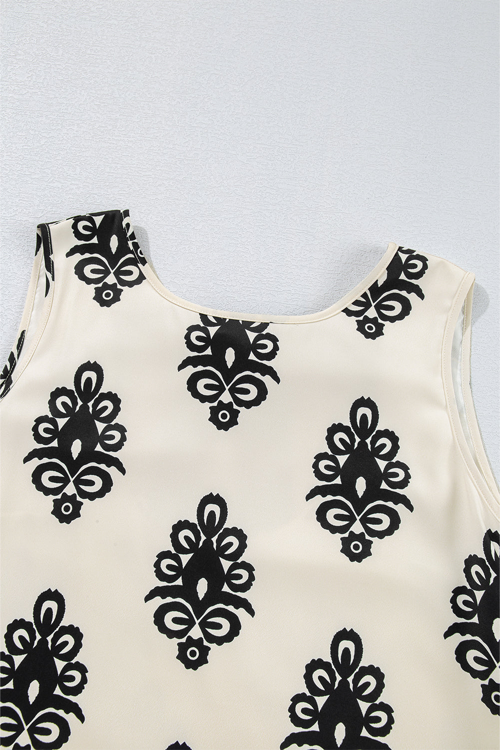 Geometric Bow‑Back Sleeveless Mini